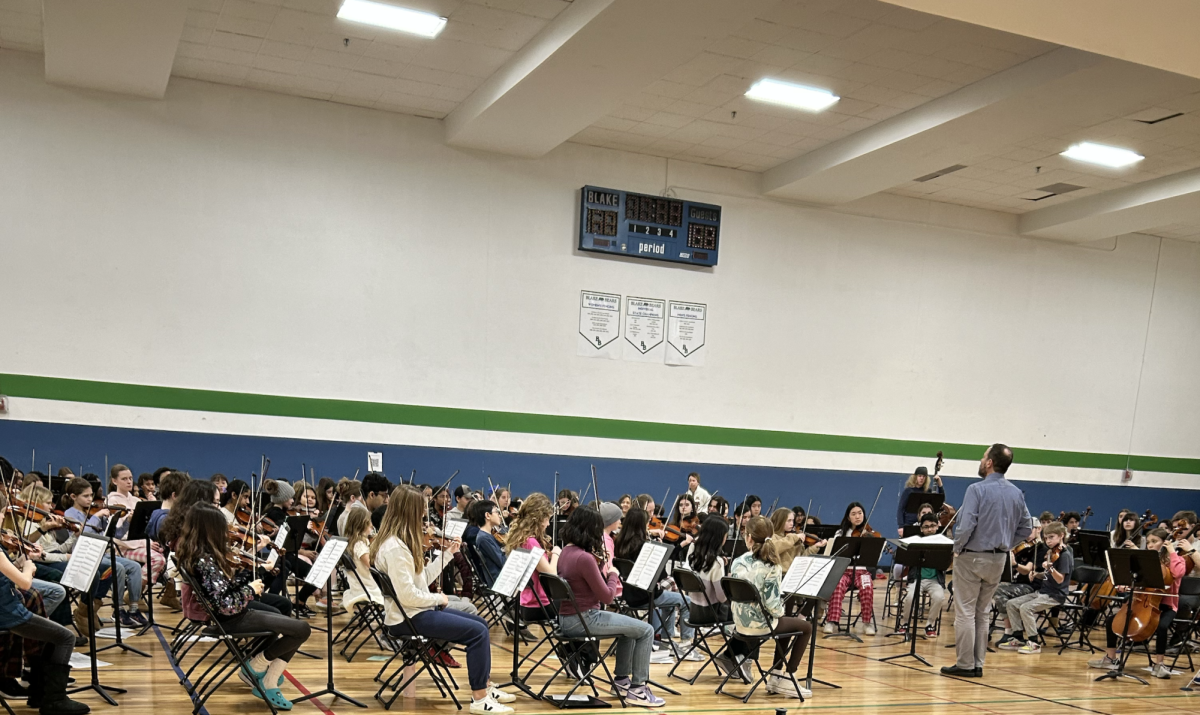 79 Middle School, 38 Upper Elementary, and 34 Upper School string students students played in the gym. “Just playing with that many people feels amazing,” said Jennifer Kalika, the Lower School String Teacher. 